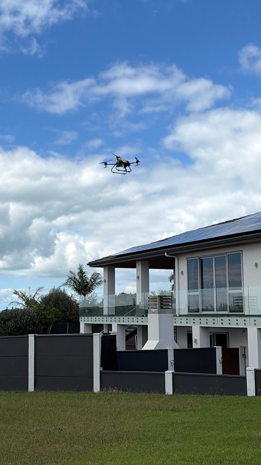 Wash drone above a home's solar roof
